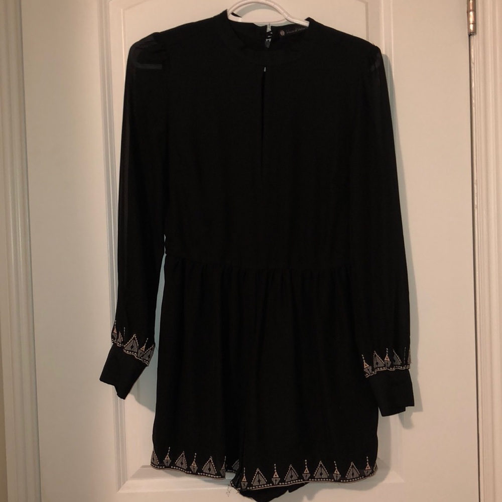 Black peep hole romper